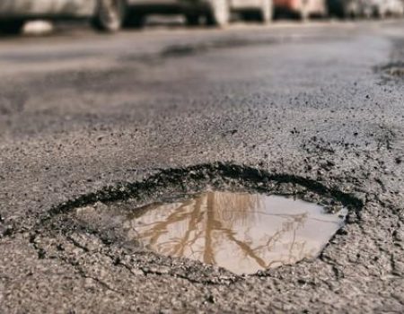 Large pothole in Montreal, Canada. Large pothole in Montreal, Canada.